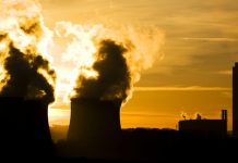 New research says 75% of Australia’s coal-fired power plants will retire by 2035 Smoke pours from chimney stacks at coal-fired power station (emissions trading)