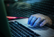 Origin confirms security breach includes customer data Sinister image of hand poised at keyboard for cyber-attack (cybercrime index)