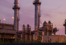 NSW launches firming tender aimed at gas peaking plants Gas peaking plant with evening sky in background