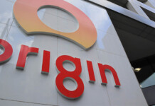 Origin Energy to refund customers after ACCC investigation Origin Energy logo on side of corporate headquarters (profit)