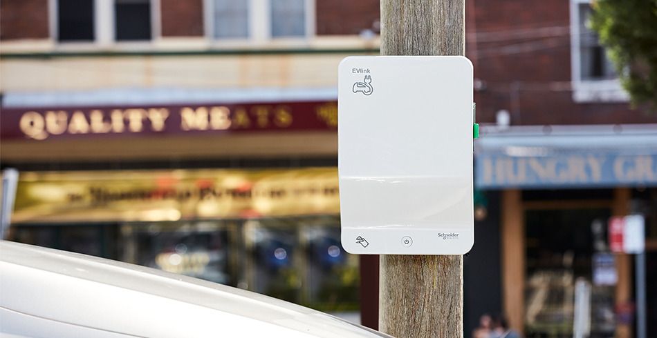 Retail-Intellihub Local power pole with EV charging station