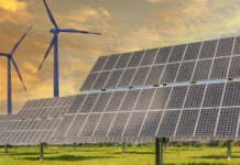 AusNet connects 10GW renewables and storage to NEM Wind turbines and solar panels against beautiful sky (gamuda)