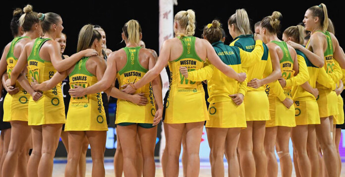 The Diamonds national netball players in a group huddle (Origin)