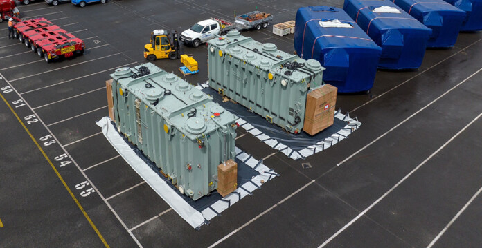 Two enormous electrical transformers at Port Kembla for Project EnergyConnect