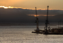 PolarBlue to build clean energy manufacturing hub in Tas Bell Bay shipping port at sunset in Tasmania (iberdrola abel)