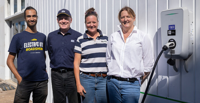 Ajaya Haikerwal (Solar Citizens), Jason Venning (FIMER), Sally Hunter (Geni.Energy) and Rebecca Reardon (NSW Farmers Association) standing beside the FIMER Wallbox EV charger