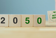 Which policies would face the chopping block under the Coalition’s retreat from net zero? Fingers place little blocks on flat table spelling out 2050 Net Zero (climate change bill)