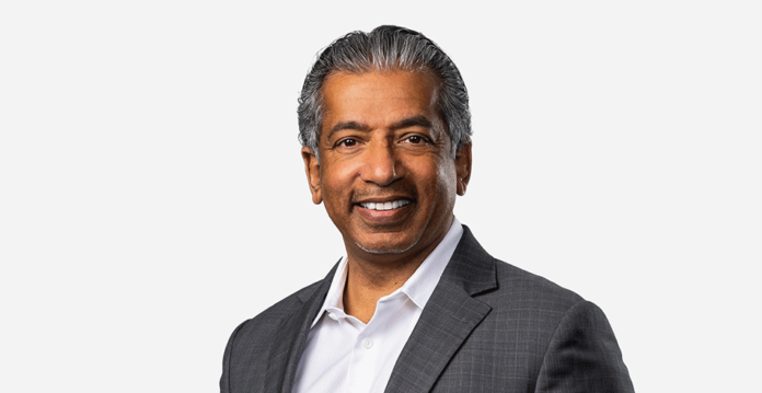 Head and shoulders shot of smiling Dr Raj Aseervatham (engineers president)