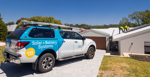 Plico van in driveway of residence having Plico solar installed on the roof (virtual power plant grid)