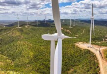 Squadron Energy applies for electricity retail licence Drone shot of wind turbines at Clarke Creek Wind Farm
