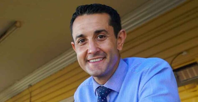 david-crisafulli Smiling David Crisafulli photographed in blue dress shirt and tie