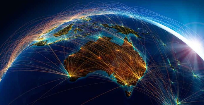 australia-globe Illustrated image of Earth with Australia in centre, and light streaks connecting continents