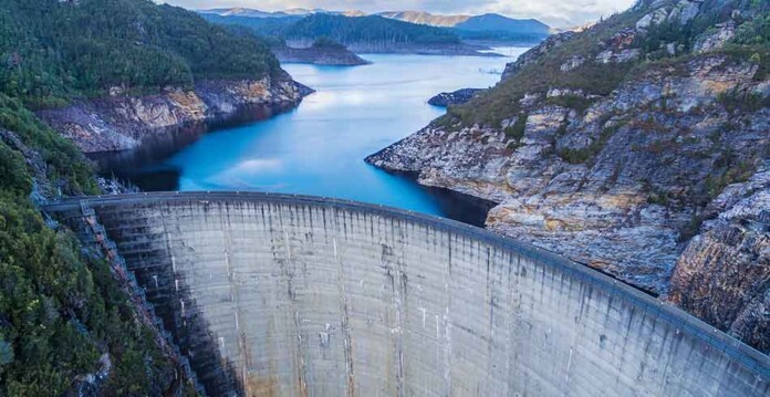 gordon-dam-new Beautiful mountain scenery with massive dam wall in the foreground