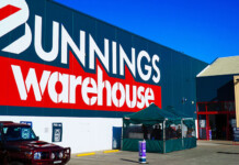 Bunnings and Intellihub expand solar and home battery offer Bunnings Warehouse storefront with vehicle and canvas tent outside