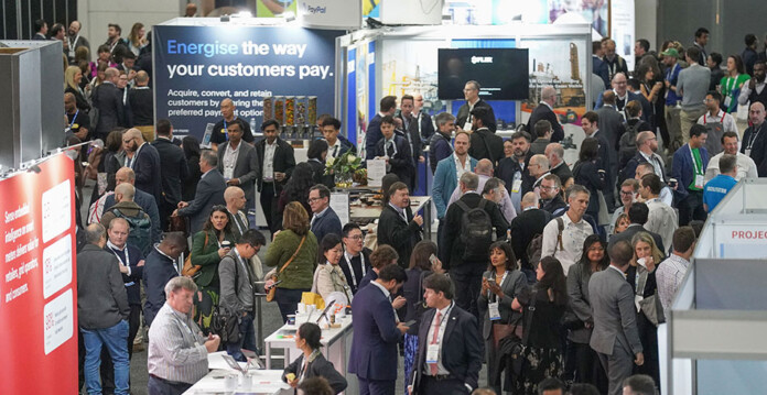 People crowding around stands in exhibition hall at Australian Energy Week
