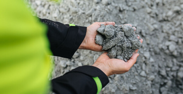 Shot of hands holding crushed soapstone