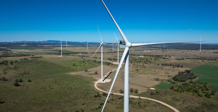 wambo-wind-farm-drone aerial shot of wind turbines at wind farm with bright blue sky overhead