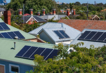 SA runs ‘fire drill for the grid’ in solar curtailment test solar panels on rooftops in suburb