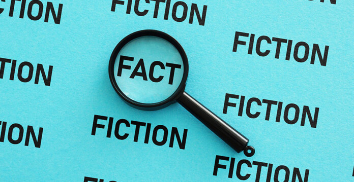 FACTS Graphical illustration showing a page with the words fact and fiction and a magnifying glass over 'fact'