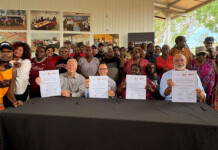 SunCable and Traditional Owners ink landmark agreement for Australia’s largest solar farm SunCable representatives and Northern Land Council representatives at table for signing of land agreement