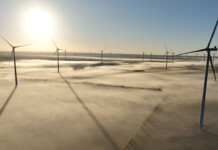 First sod turned at Delburn Wind Farm in Victoria Vestas wind turbines with blue sky and sun in background