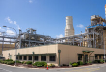 Major project: Pelican Point Power Station upgrade Aerial shot of gas-fired power station with blue sky overhead