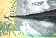 Avoiding a costly split due to irreconcilable differences Close-up of Australian $100 note torn horizontally