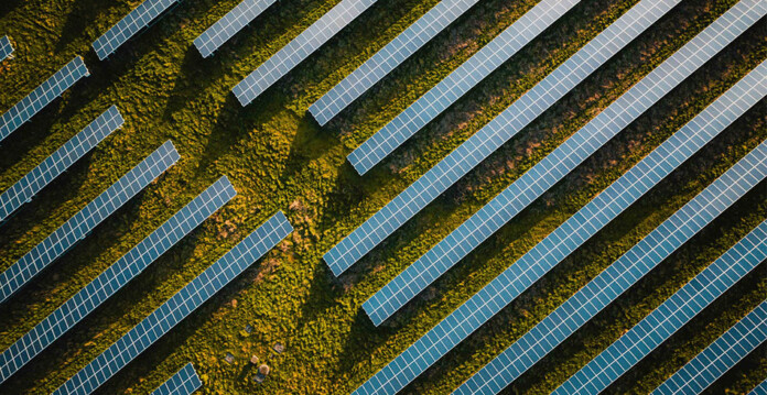 Aerial shot of solar arrays at a solar farm