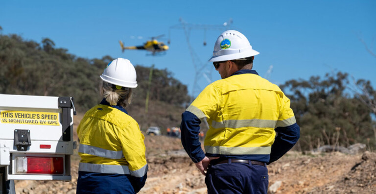 Helicopter strings transmission lines at Uungula Wind Farm