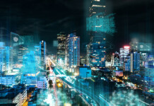 Managing low-voltage networks in Australia’s distributed energy transition Futuristic looking cityscapr with LED lights against black night sky