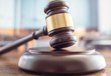 Western Power fined over inadequate pole inspection Gavel placed on desk in law chamber
