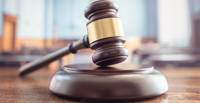Gavel placed on desk in law chamber