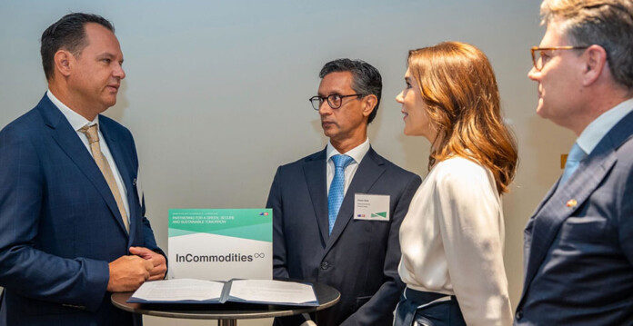 Energy executives chat to the Danish Queen at a company signing
