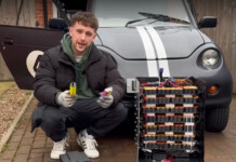 British engineer uses discarded vapes to build EV battery A man poses in front of a tiny electric car with a homemade battery pack made from discarded vapes