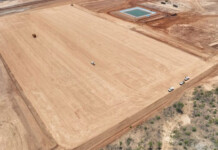Aggreko to build Australia’s largest off-grid hybrid renewables facility in north-west Queensland Aerial shot of a large bulldozed parcel of land at a mining site