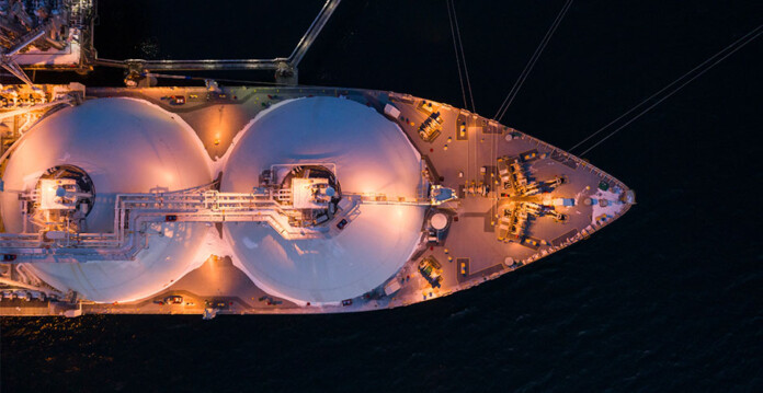 Aerial shot of the front half of an LNG tanker at sea