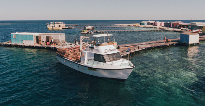 Fishing trawler moored at a seaside dock