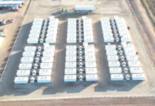 Australia’s first 8-hour battery becomes fully operational aerial shot of battery units at a large-scale battery project