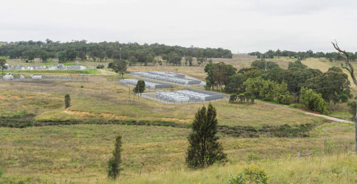 Rendered image of a large battery storage project in a regional grassy area