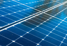 Infrared light breakthrough could improve solar panels Close-up of solar panels with sun shining on them