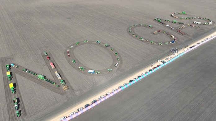 default Aerial photo shows tractors strategically parked on agricultural land to spell out 'NO GAS'