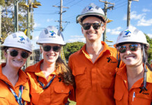 Ausgrid kicks off search for future bright sparks Four apprentices in Ausgrid hard hats and work uniforms