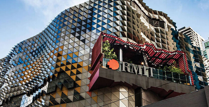 External shot of ultra-modern RMIT University building with blue sky overhead