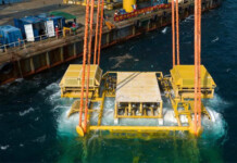 China completes world’s first underwater data center Underwater data centre components being lowered into the sea by a crane vessel