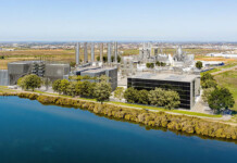 ARENA backs HAMR Energy forestry-to-fuels projects Rendered image of a methanol to jet fuel production facility set beside a river