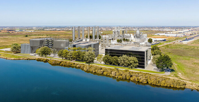 Rendered image of a methanol to jet fuel production facility set beside a river