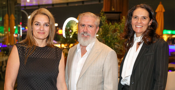 CNC Project Management owners Tricia Grant and Dave Maloney along with their CEO Liz Veneziano dressed in evening attire