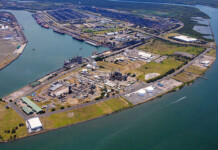 Orica to proceed with Hunter Valley Hydrogen Hub Aerial photo of industrial ammonia production facility on a peninsula surrounded by blue water in a bay
