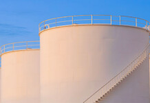 Australia hasn’t built an oil refinery in decades—but that could be set to change Massive crude oil storage tanks at an oil refinery with blue sky overhead