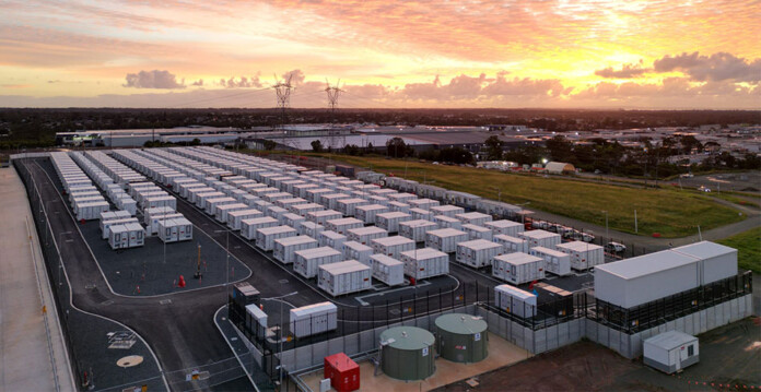 Aerial photo of battery units at the Supernode battery project with orange dawn sky overhead